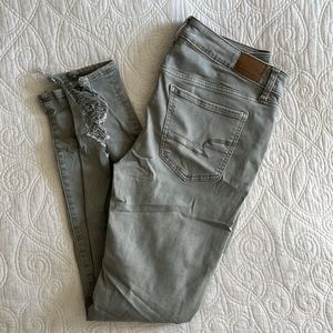 American Eagle Green shredded sage green skinny jeans